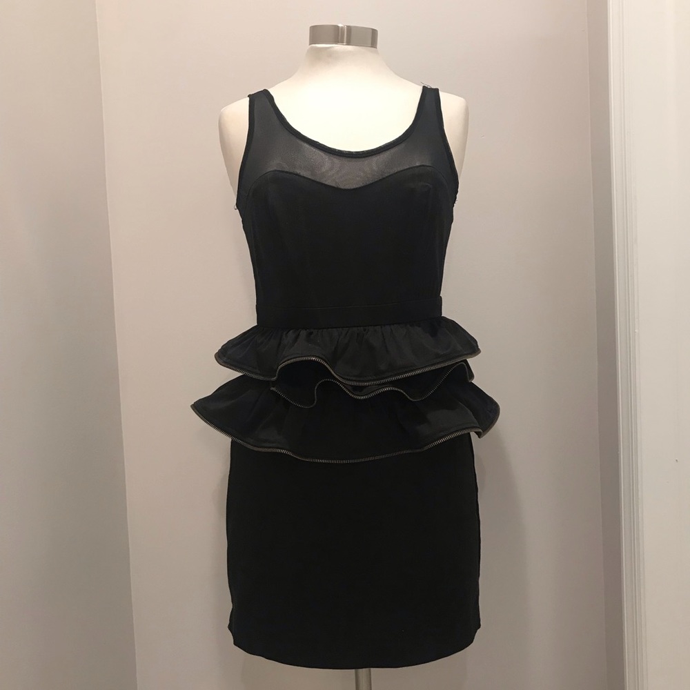 Black cocktail dress with peplum